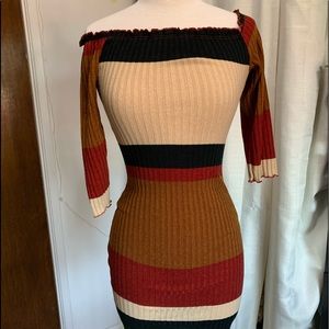 Neutral colored dress. Off the shoulders